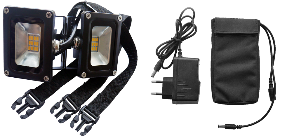 Vento Zelt LED Beleuchtung mit zwei Scheinwerfern, Netzteil und Kabel in schwarzem Aufbewahrungssack.